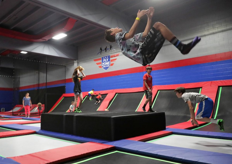 Kids playing and jumping at the trampoline park