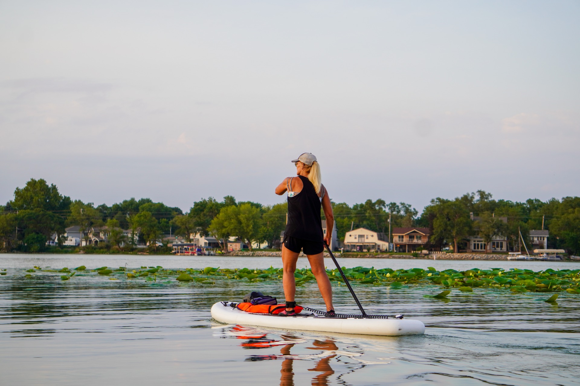 Woman on a stand up paddle board